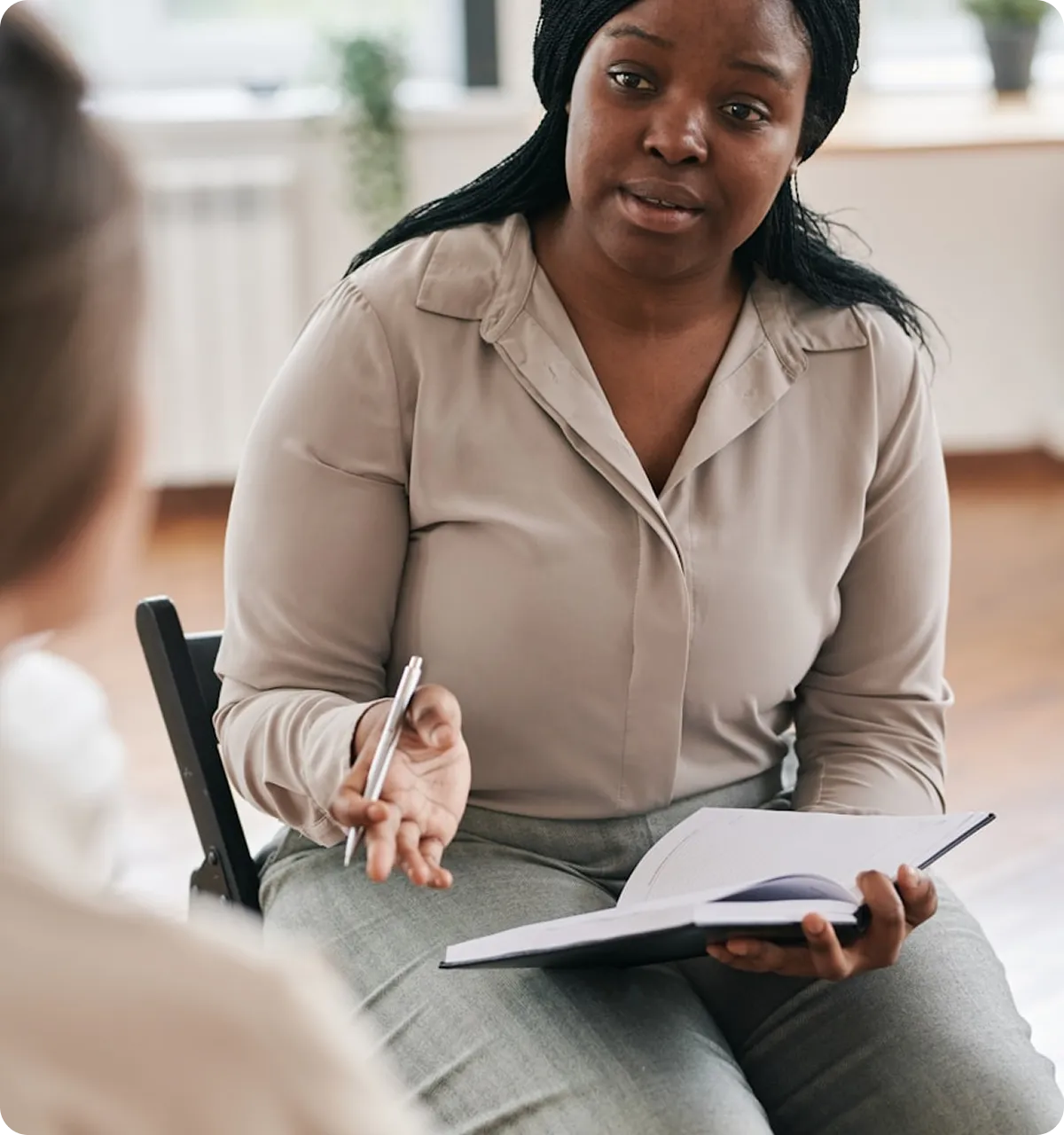 Professional therapist conducting counseling session in Virginia Beach - PIL Counseling mental health services